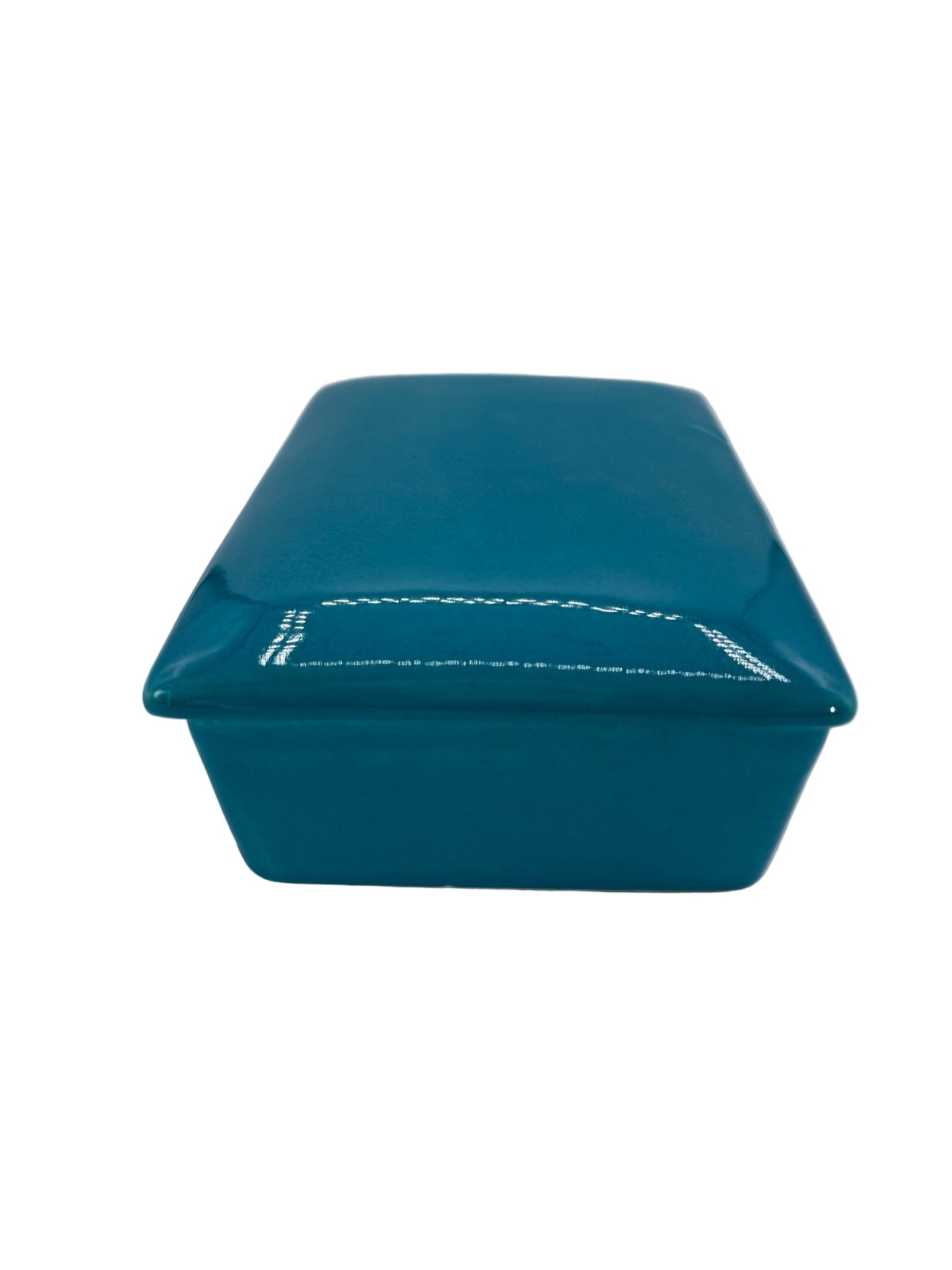 Teal rectangular box with a white lid on a white background