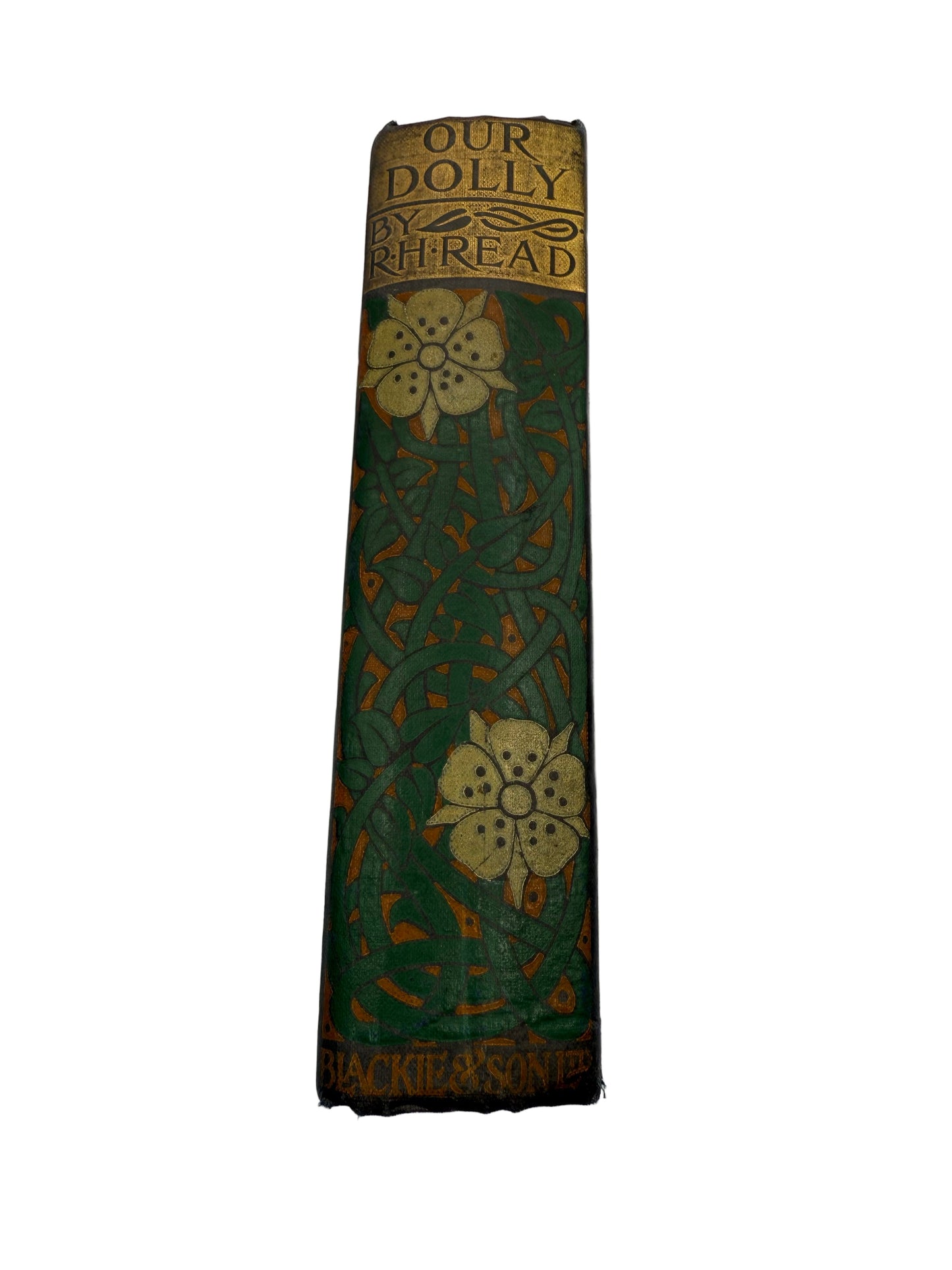 Vintage book with decorative green and gold binding on a white background