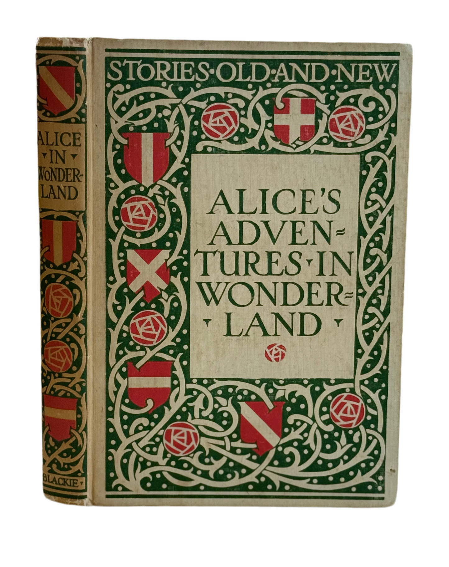 Alice's Adventures in Wonderland by Lewis Carroll a vintage edition with green and red cover decoration that says stories old and new