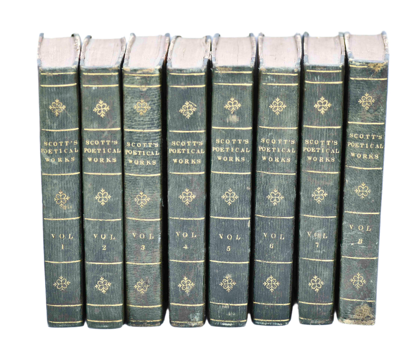 A set of antique green leather books with title stripes and marbled covers,The Poetical Works of Sir Walter Scott, volumes 1 to 8.