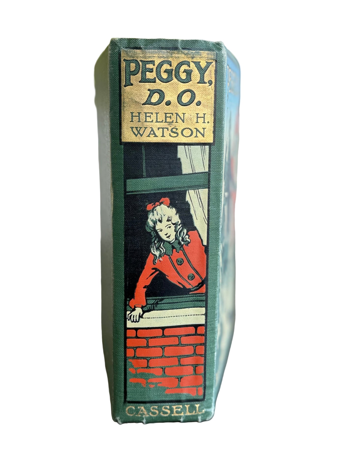 Book titled 'Peggy D.O.' by Helen H. Watson with a green spine and colorful front cover on a wooden surface.