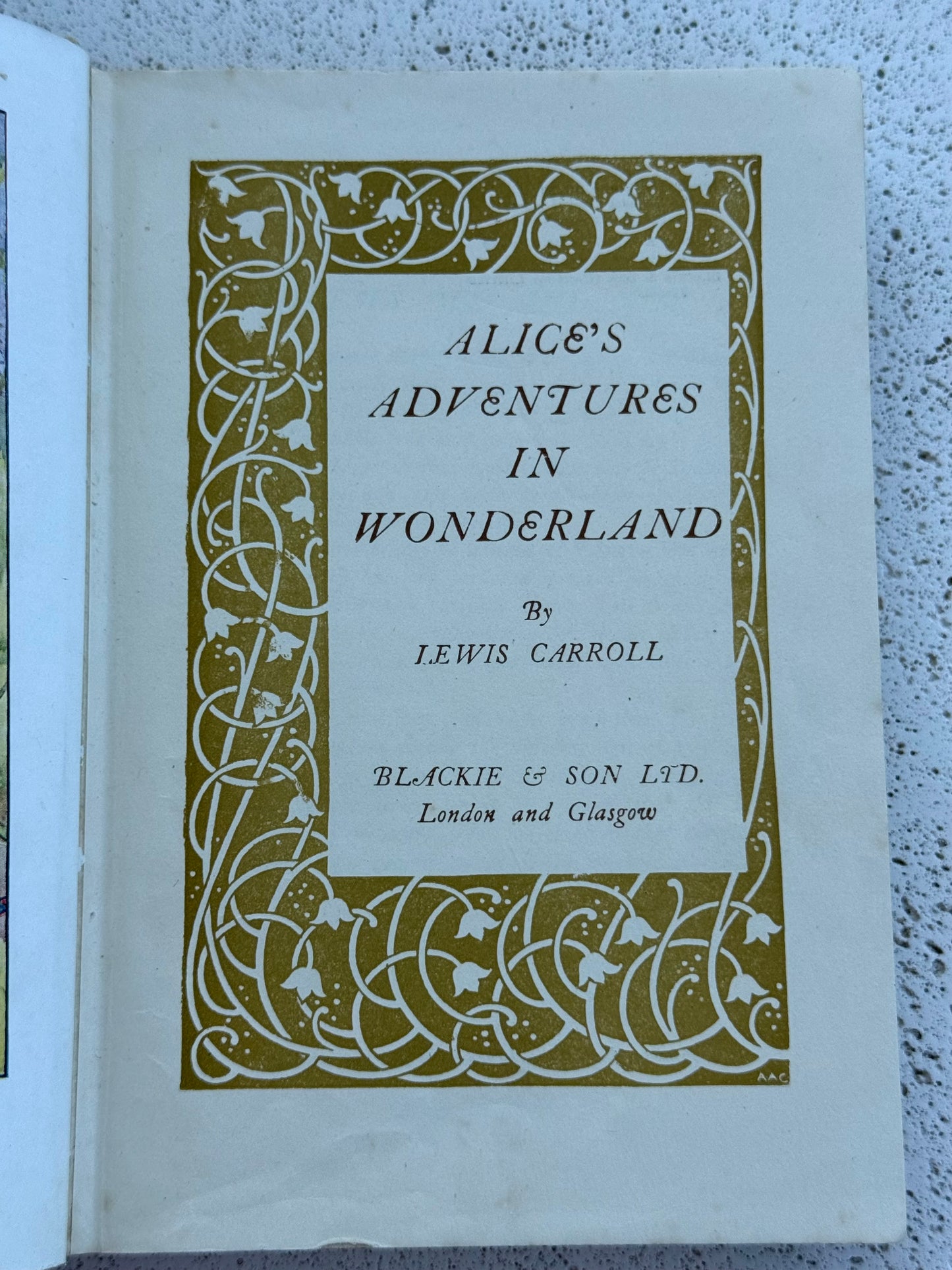 The title page from Alice's Adventures in Wonderland by Lewis Carroll from Blackie and Sons, London