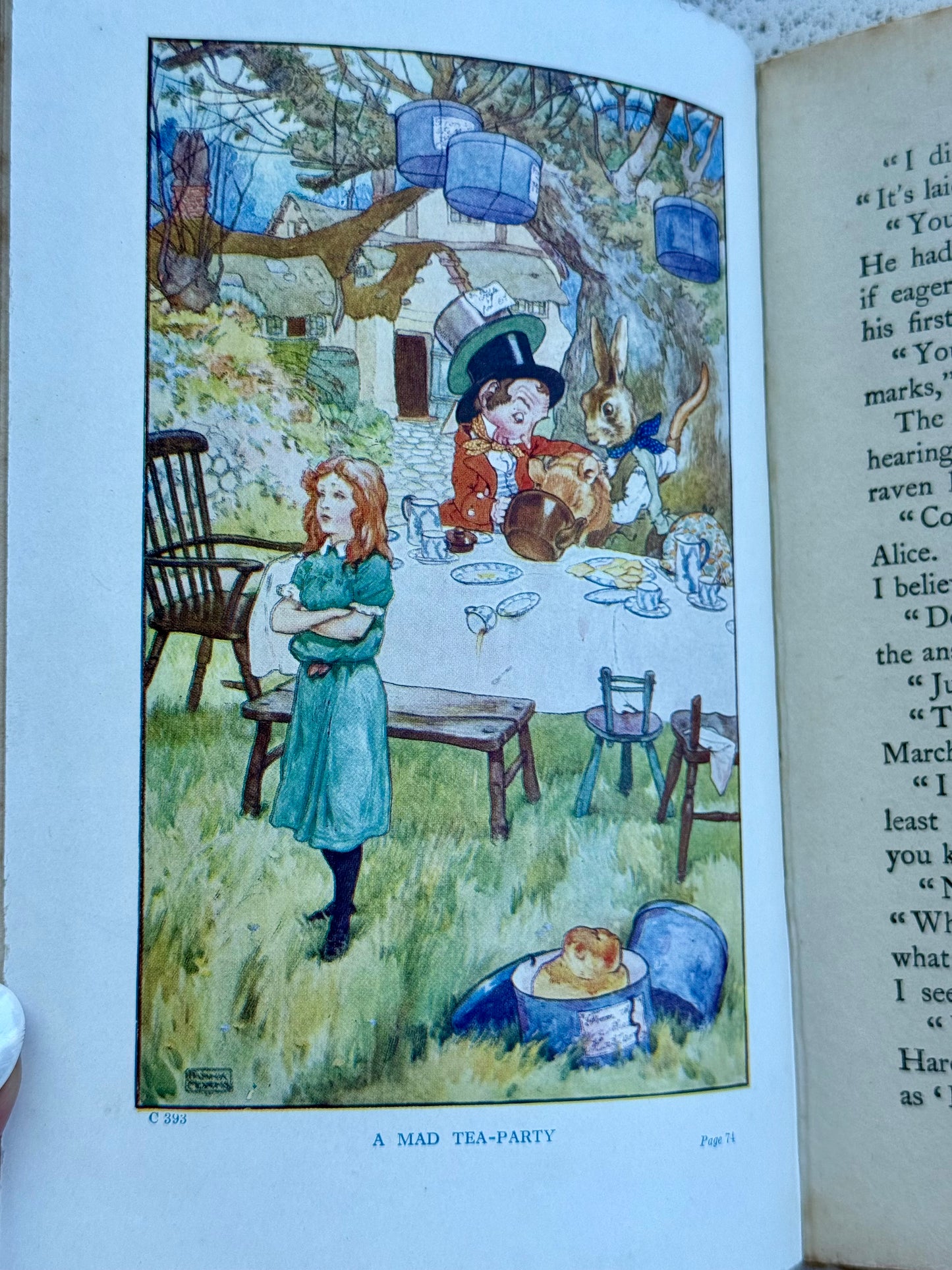 Illustration of the mad hatter and Alice from Alice's Adventure's in Wonderland, published by Blackie and Sons