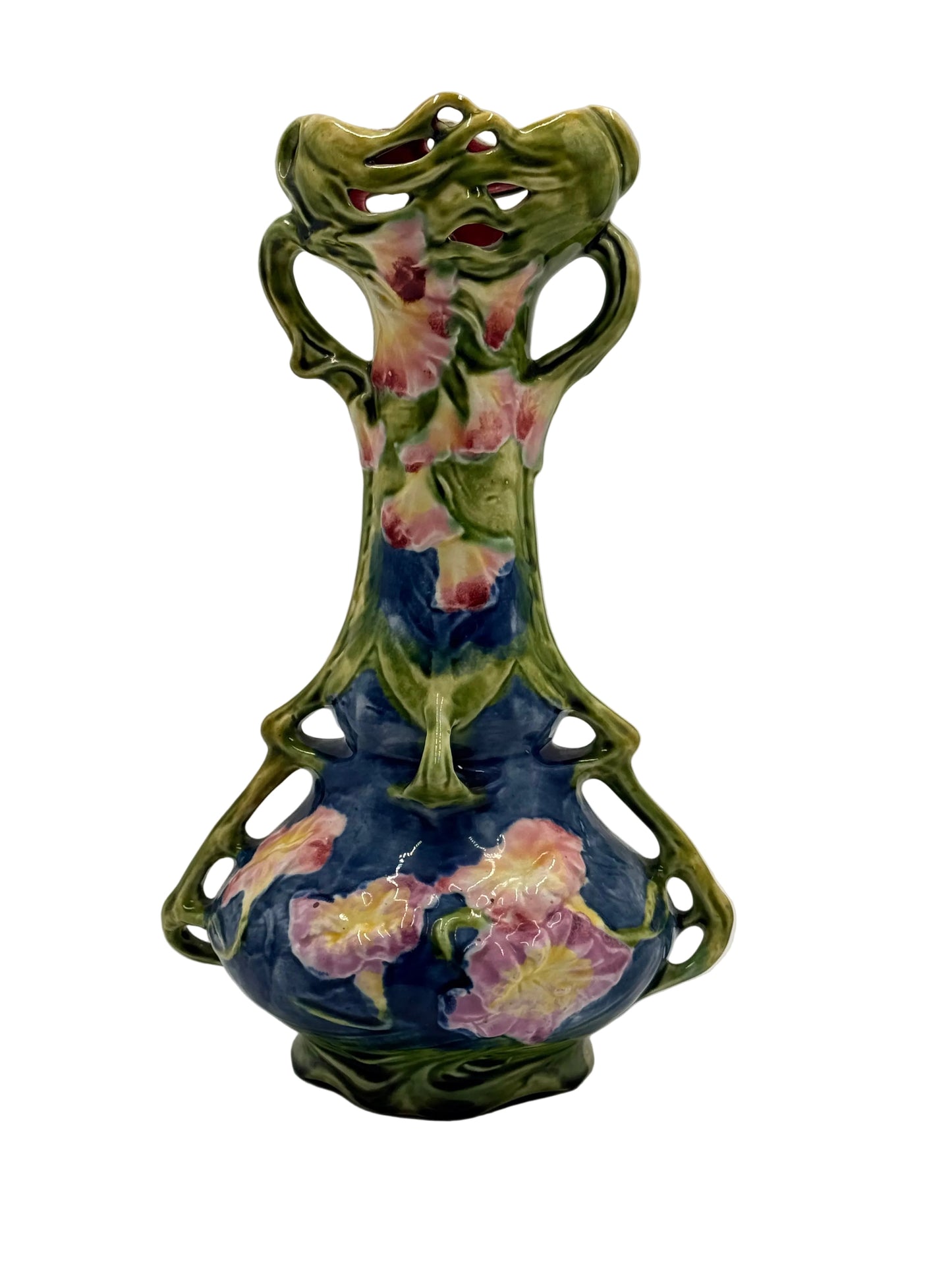 Decorative ceramic wall vase with floral design on a plain background
