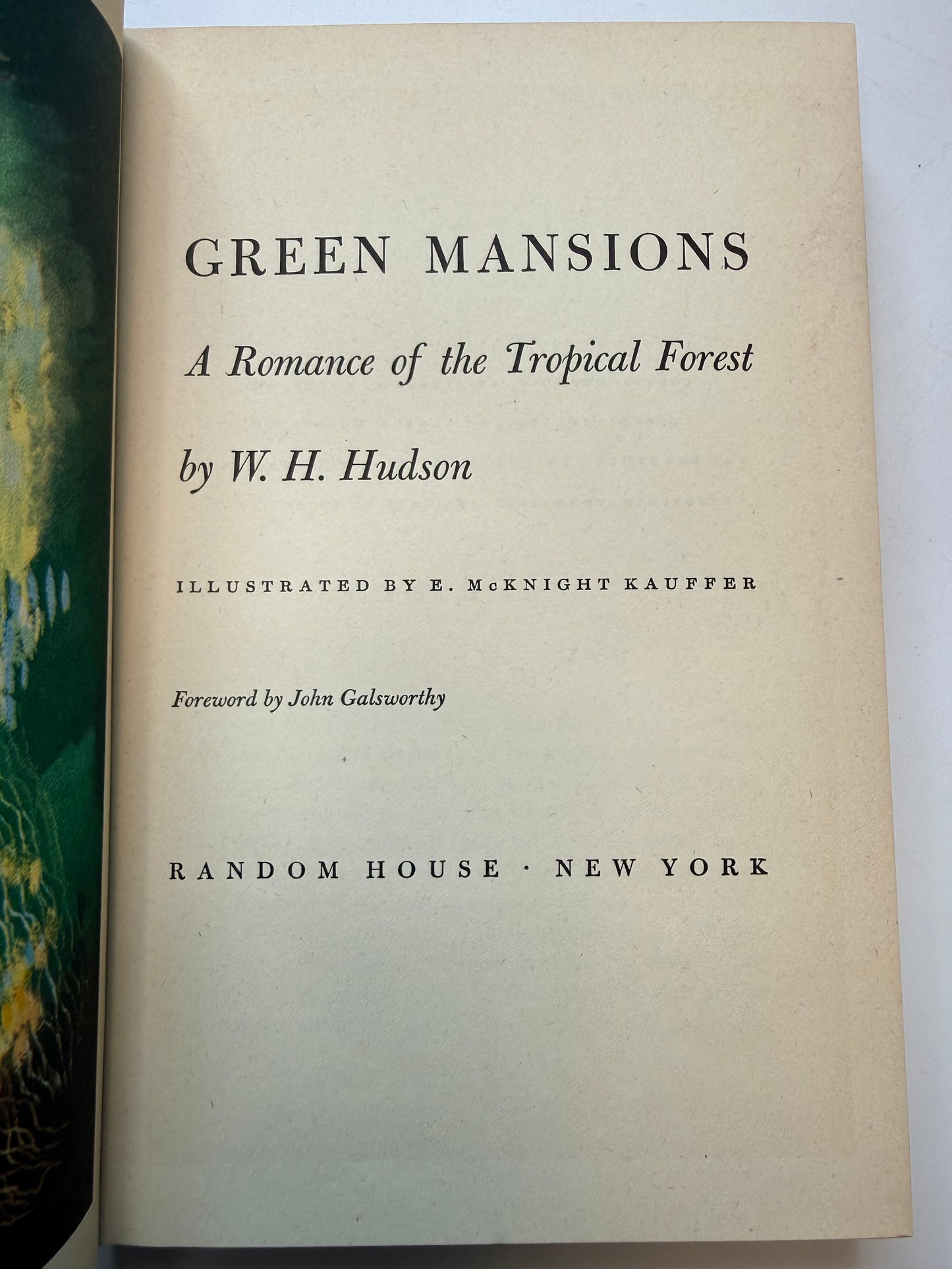 Book cover of 'Green Mansions' by W. H. Hudson with text and a map on a white background