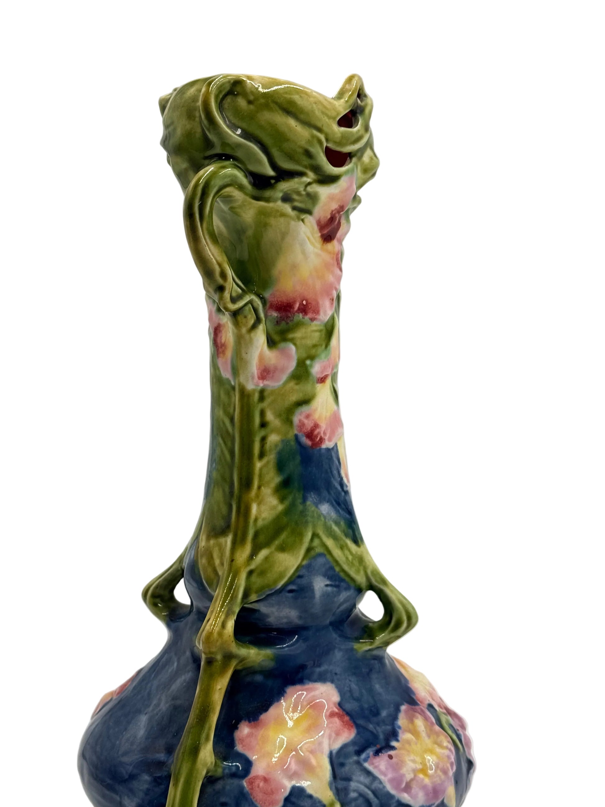 Decorative ceramic vase with floral design on a plain background