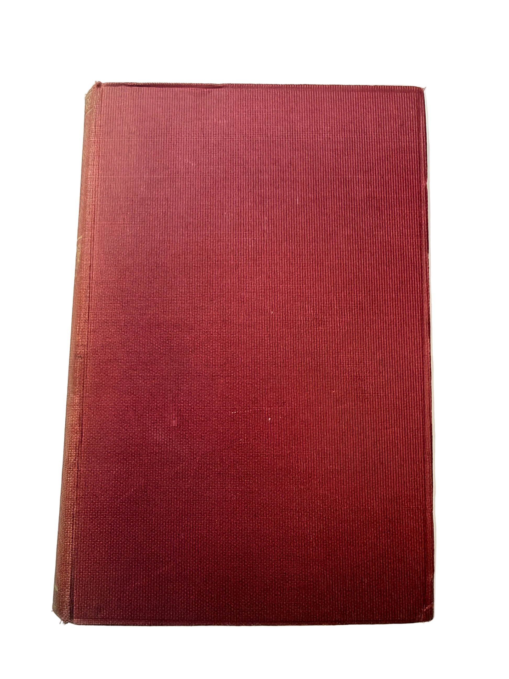 Maroon book on a white background