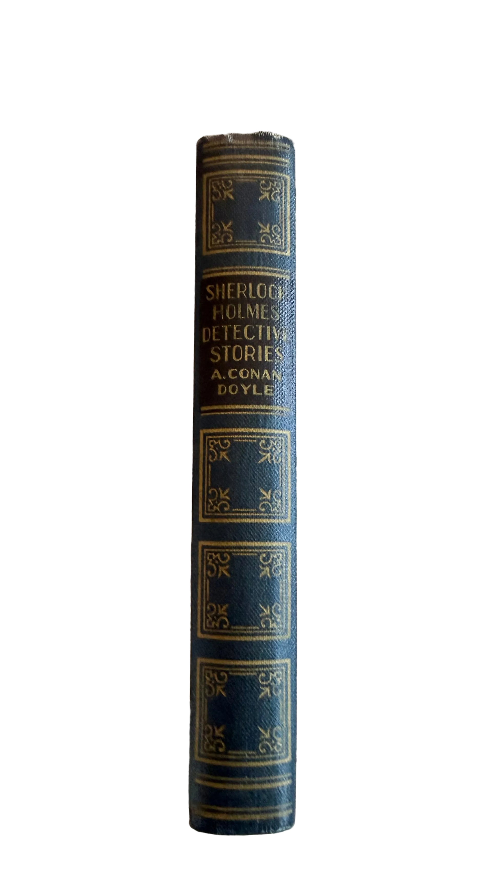 Vintage book titled 'Sherlock Holmes Detective Stories' on decorative background