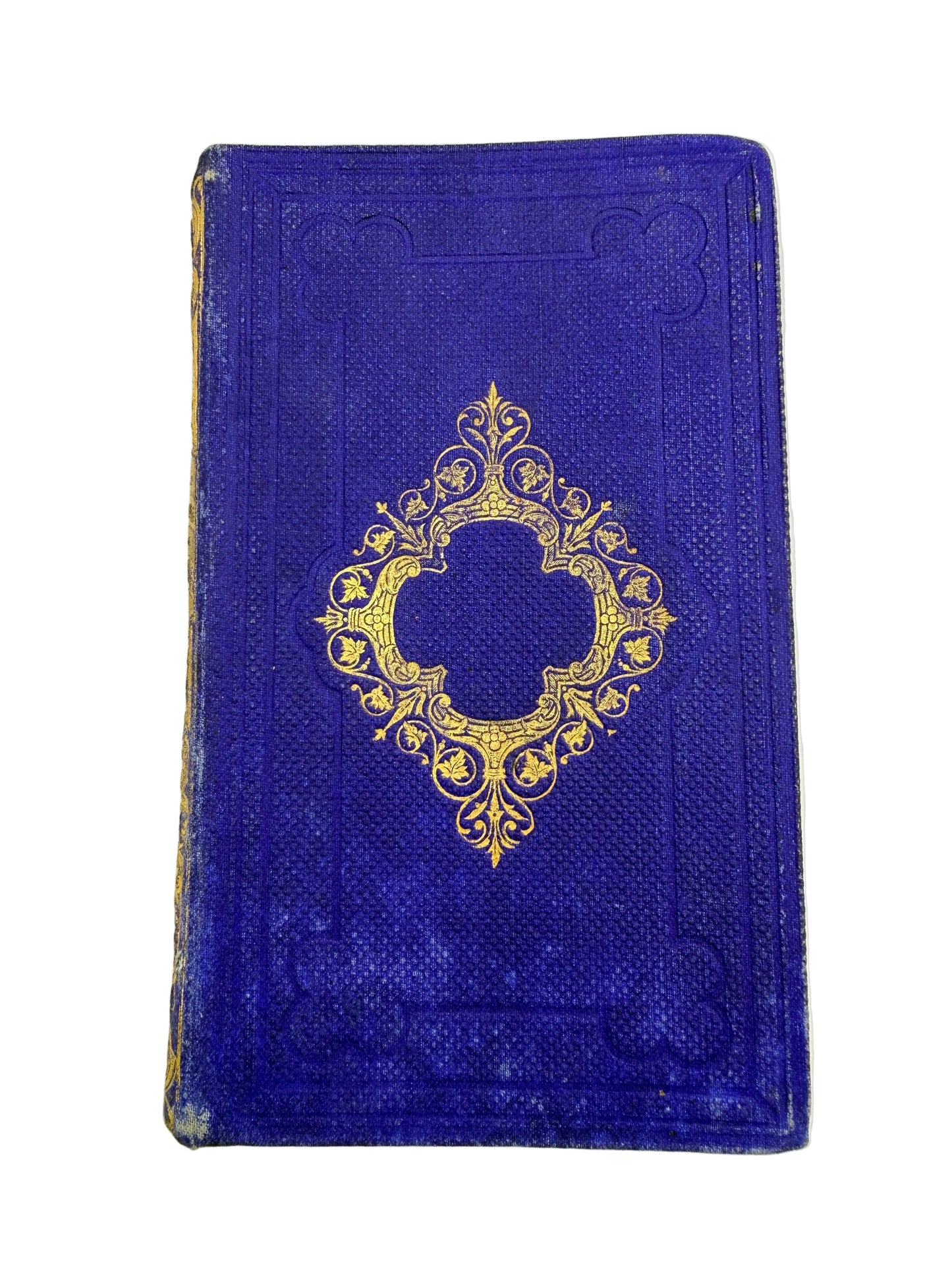 Blue book with gold decorative emblem on a white background