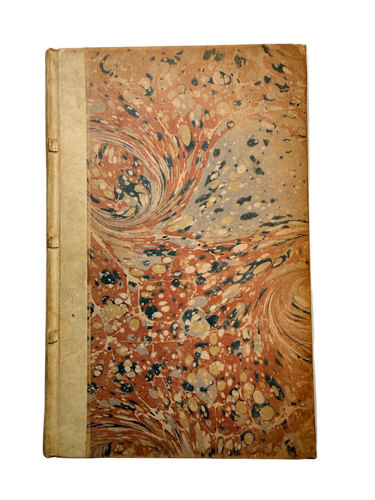 Marbled paper with swirling patterns on a white background