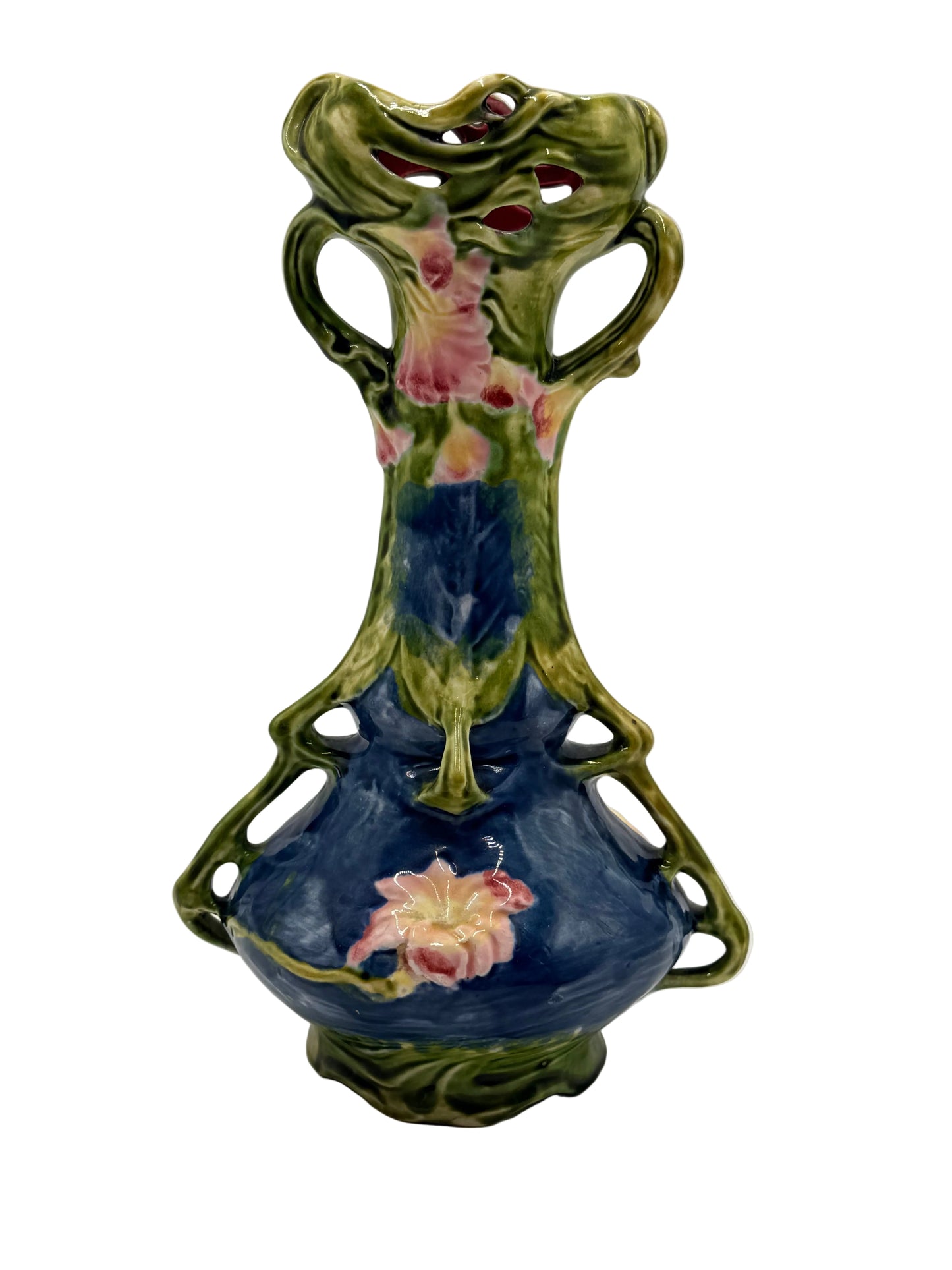 Decorative ceramic wall vase with floral design on a plain background