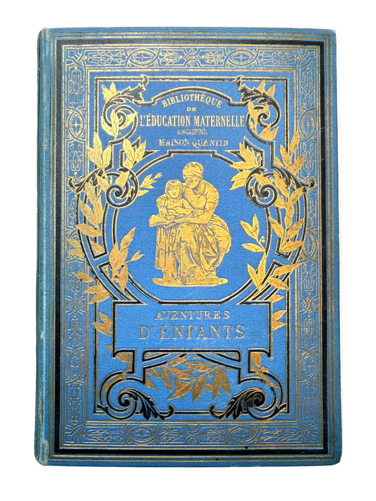 Decorative blue book with gold embossed design on a white background