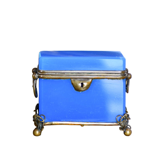 A blue glass opaline box with bronze footings and hardware and a key hole
