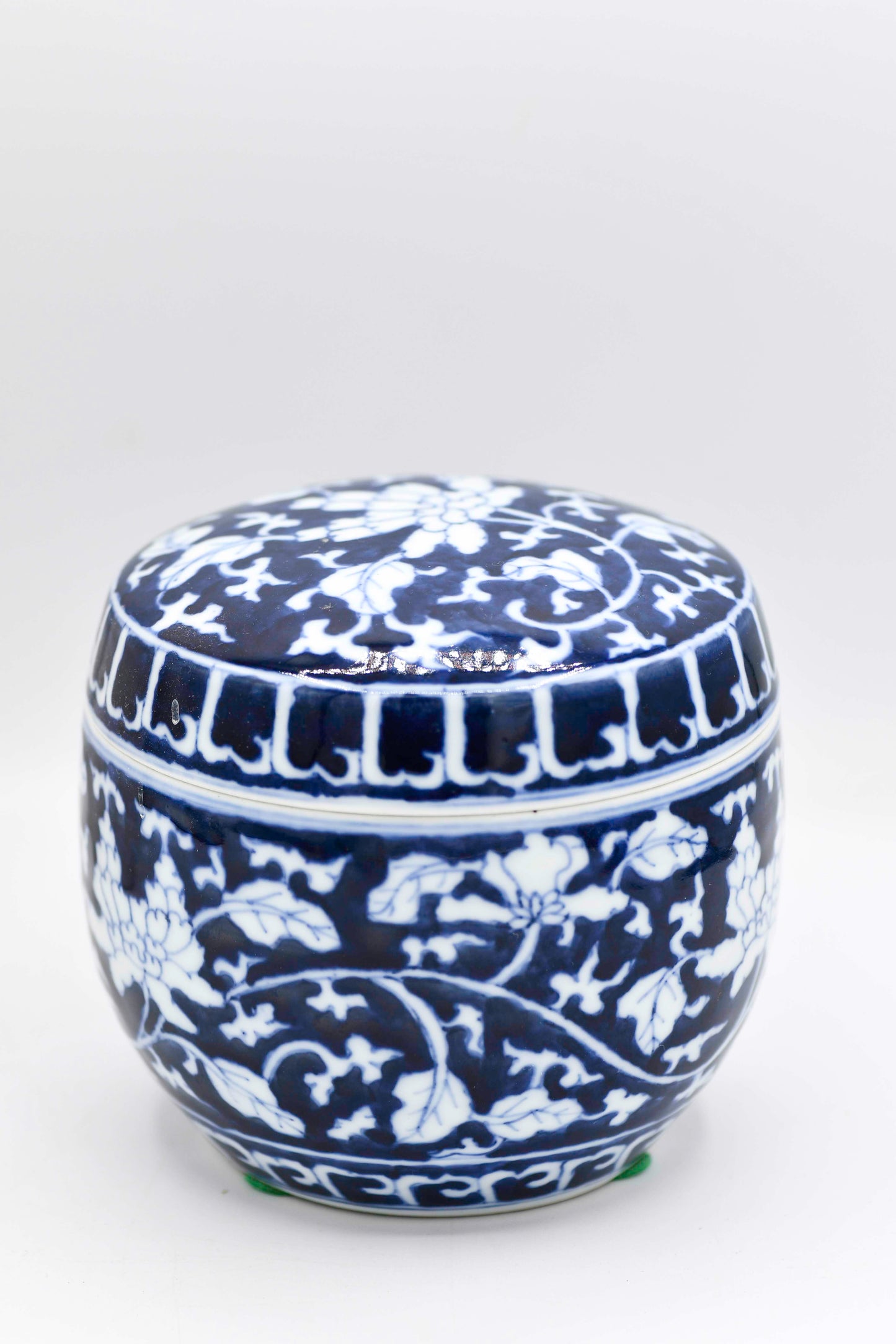 Blue and white hand painted lidded container 