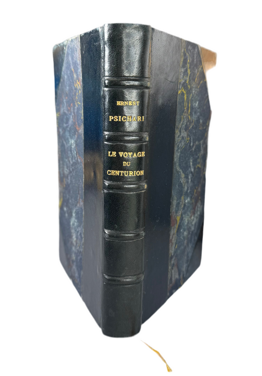 Vintage book with decorative blue and black binding on a white background