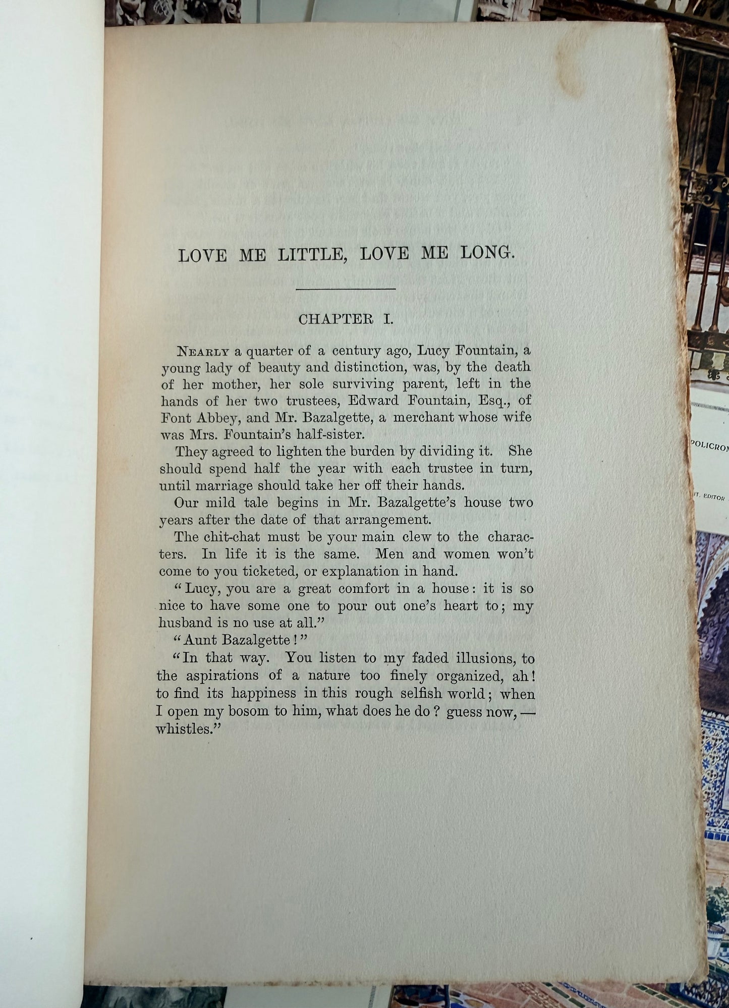 Page from a book with text on a textured surface