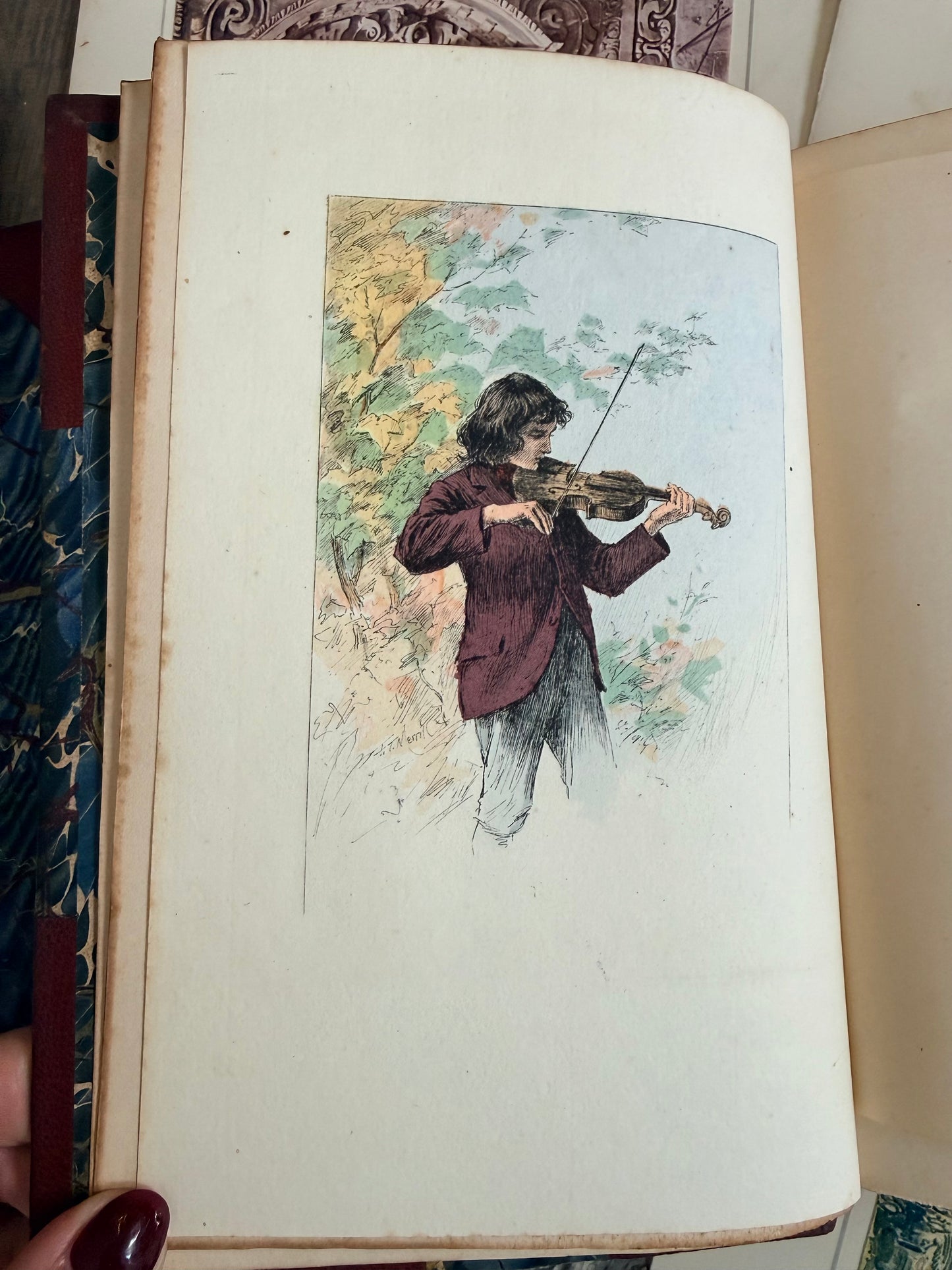 Vintage illustration of a person playing a violin in an open book