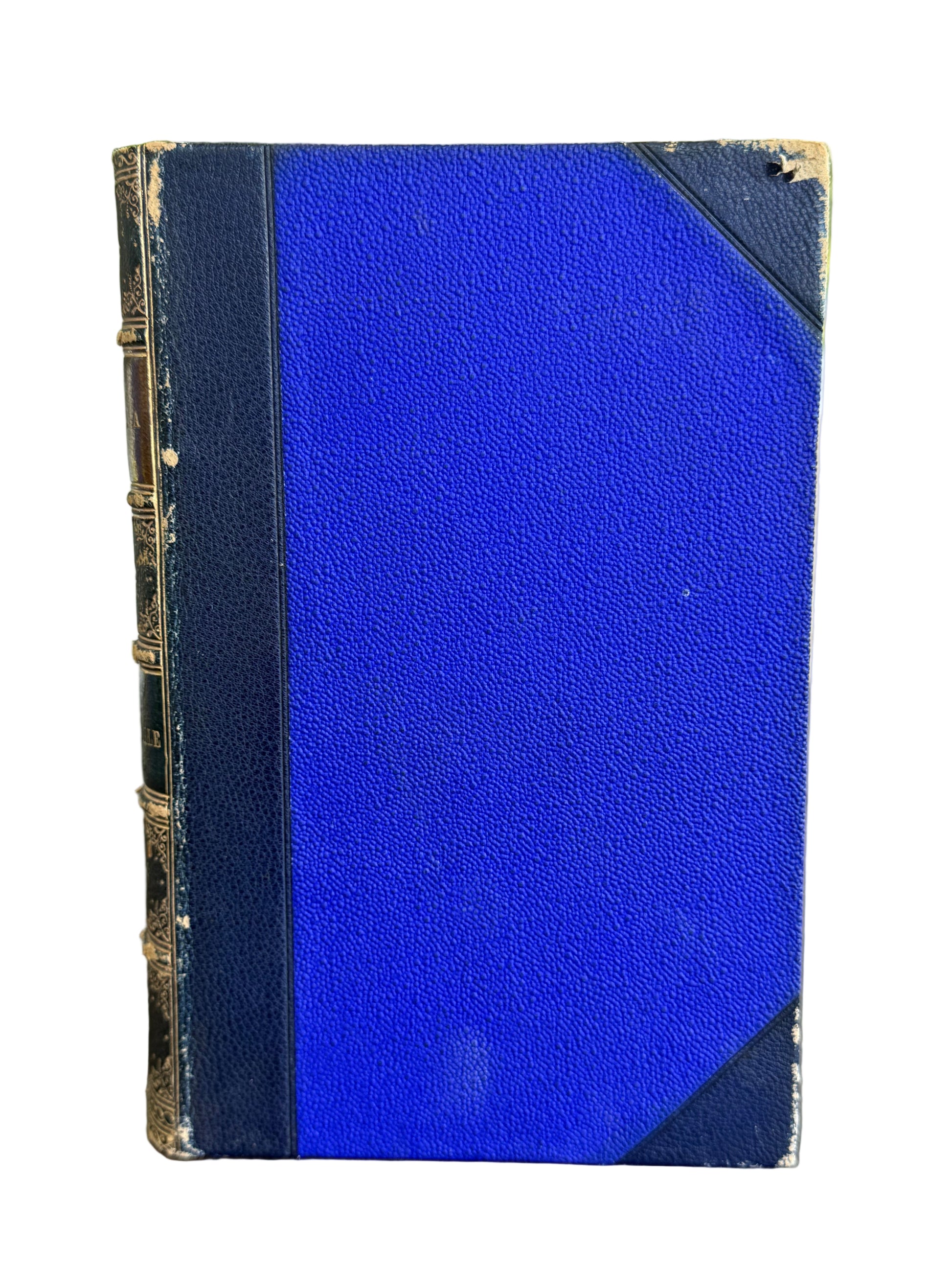 Blue rectangular object with textured surface on a blurred background