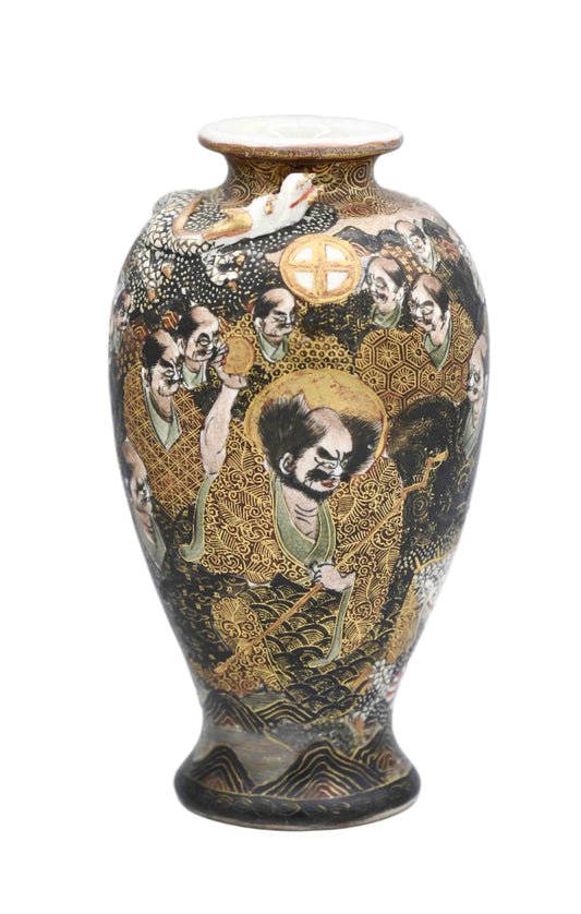 A hand-painted porcelain Satsuma vase featuring a figure and a dragon with gold and multicolor decoration on a blue background.