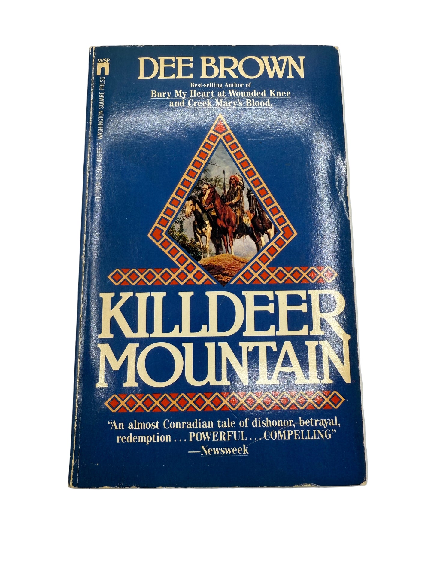 Book titled 'Kildeer Mountain' by Dee Brown on a white background