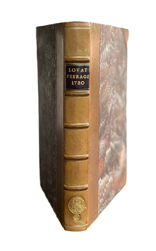 Vintage book with leather binding and gold embossing on a white background. Lovat British Peerage Historical records
