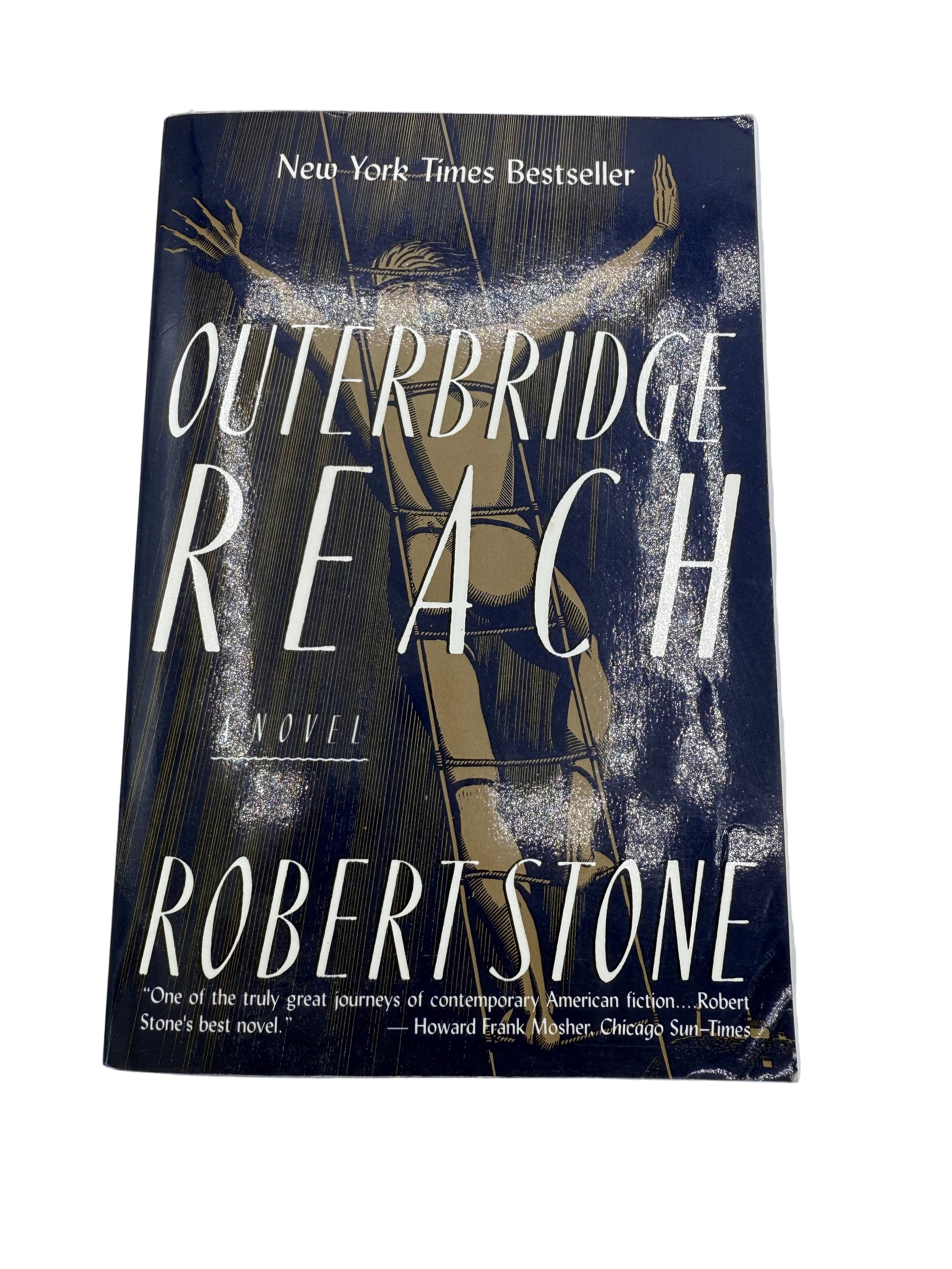 Book titled 'Outerbridge Reach' by Robert Stone on a light gray background