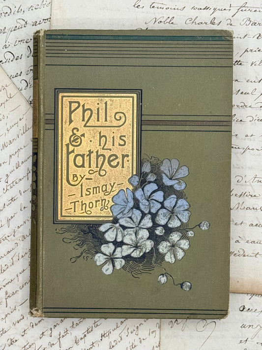 Vintage book with floral design and text on a textured background