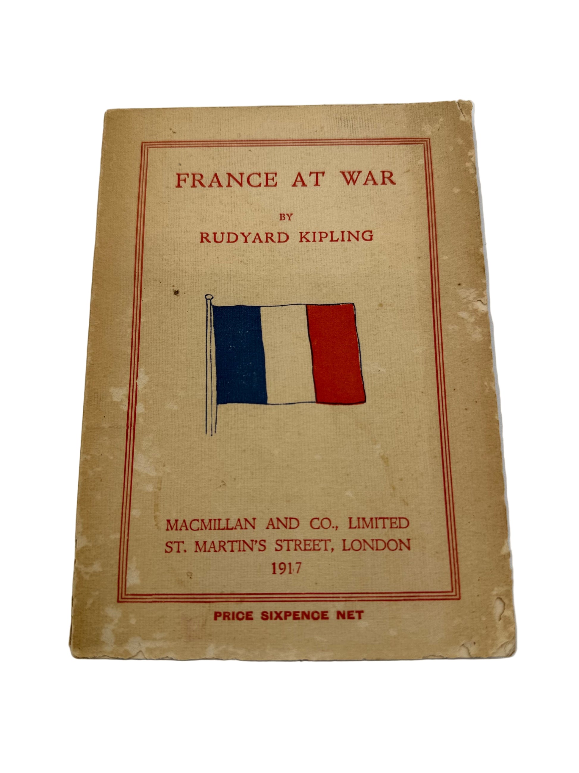 Book cover of 'France at War' by Rudyard Kipling with a flag illustration on a beige background