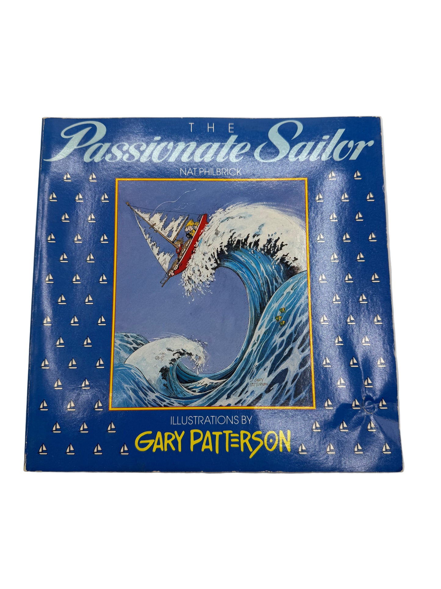Book cover of 'The Desperate Sailor' with a blue wave and sailboat illustration on a white background