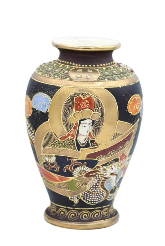 A vintage Japanese Satsuma polychrome and porcelain vase featuring a female figure and a dragon, with gold accents and colorful decorative patterns.
