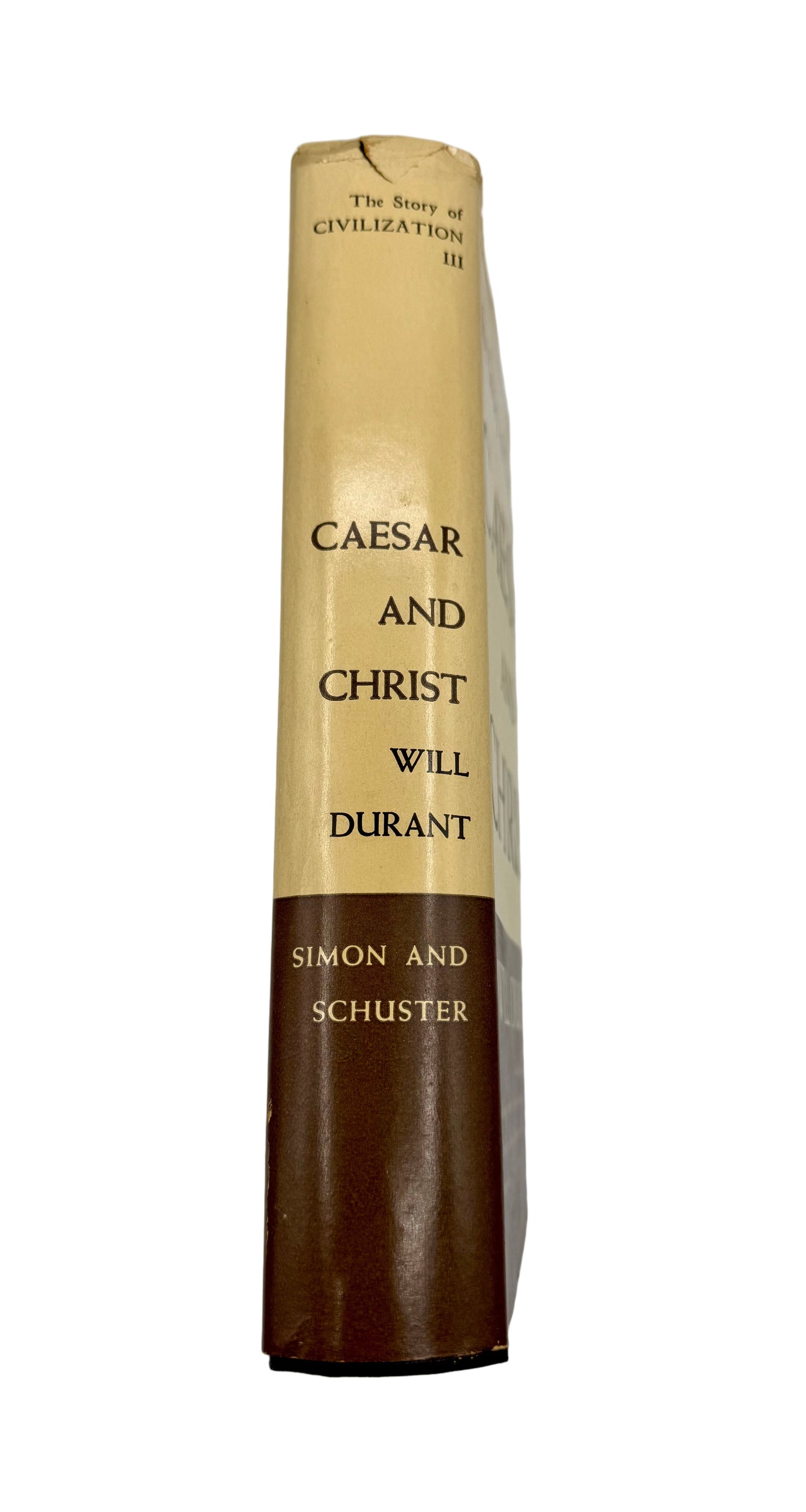 Book titled 'Caesar and Christ' by Will Durant on a white background