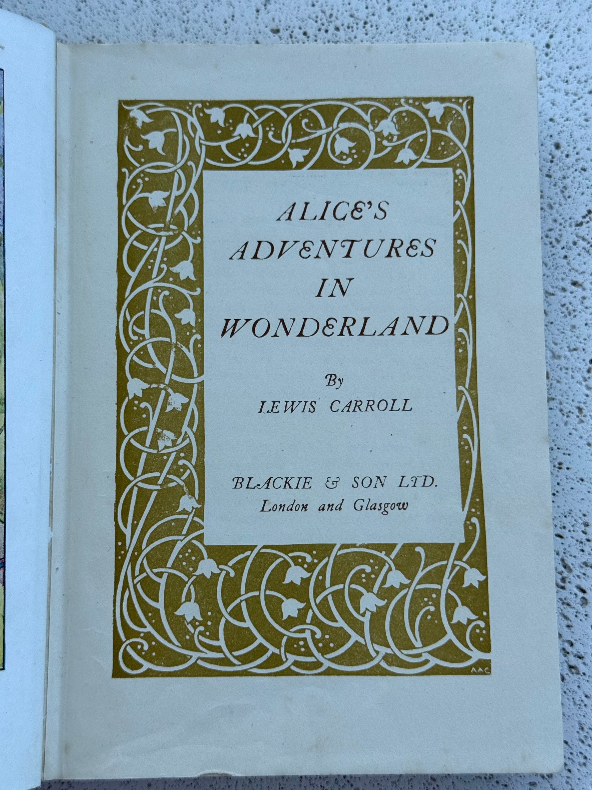 The title page from Alice's Adventures in Wonderland by Lewis Carroll from Blackie and Sons, London