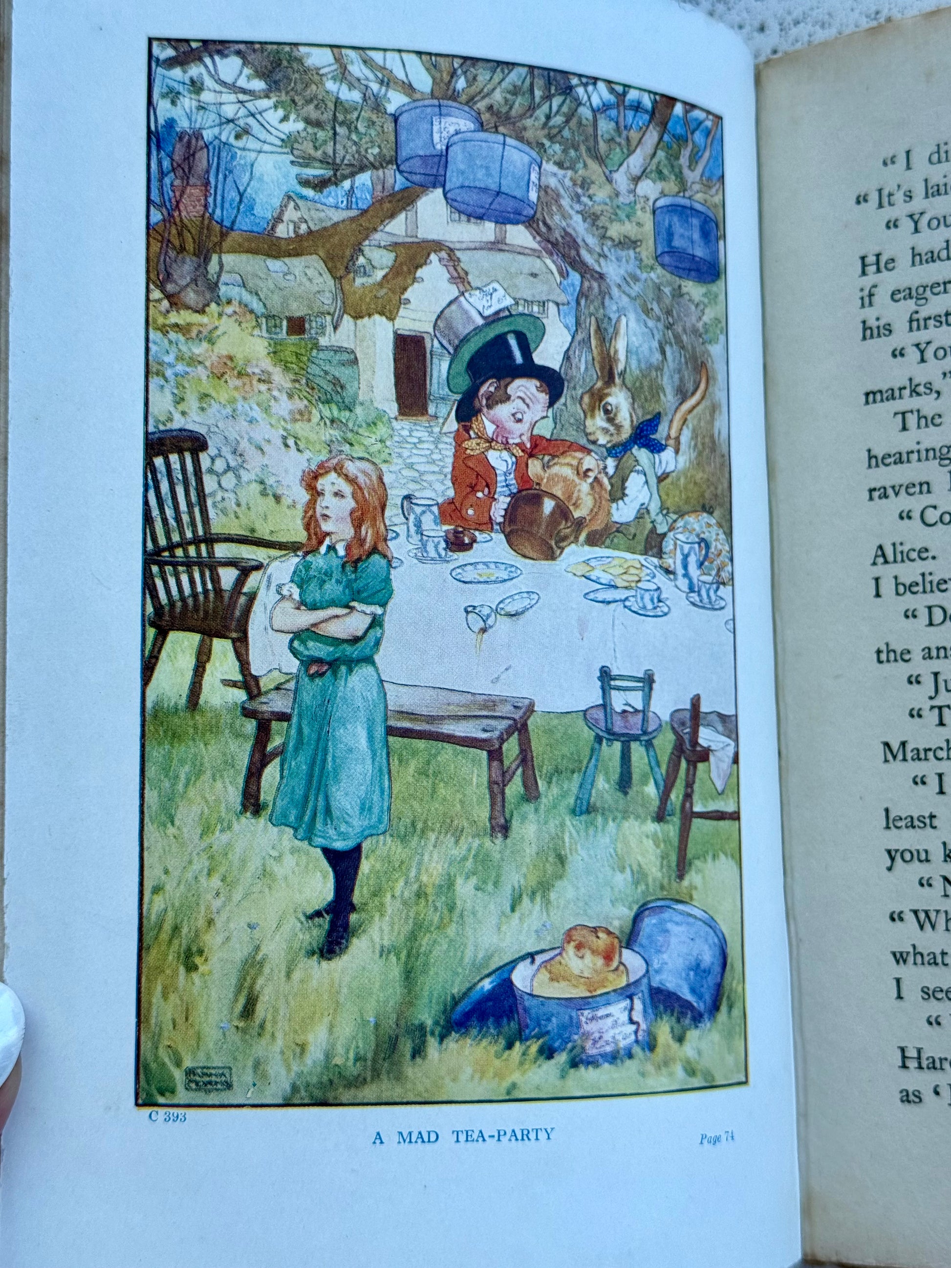 Illustration of the mad hatter and Alice from Alice's Adventure's in Wonderland, published by Blackie and Sons