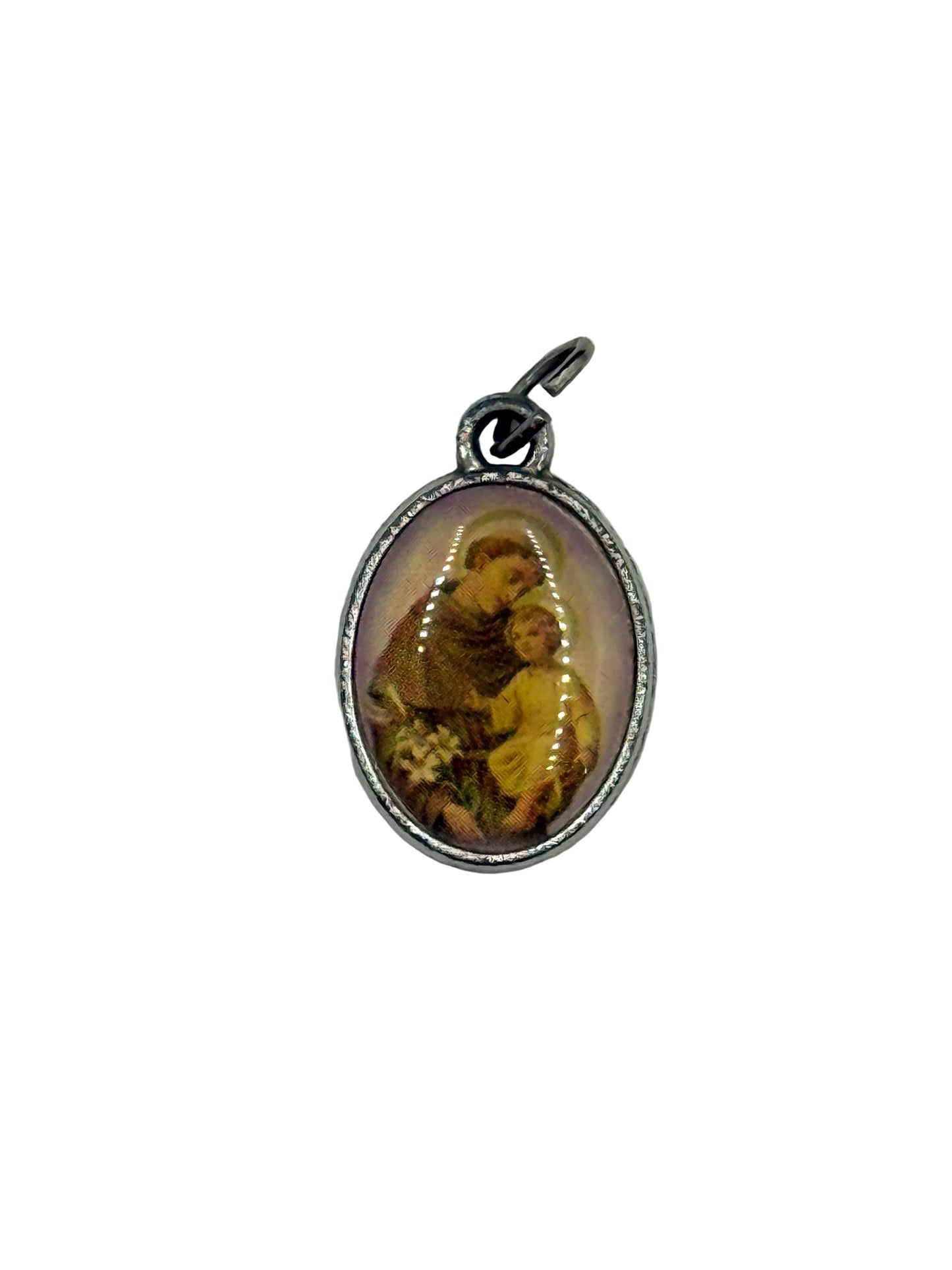 Pendant with a religious scene of a woman holding a child on a white background